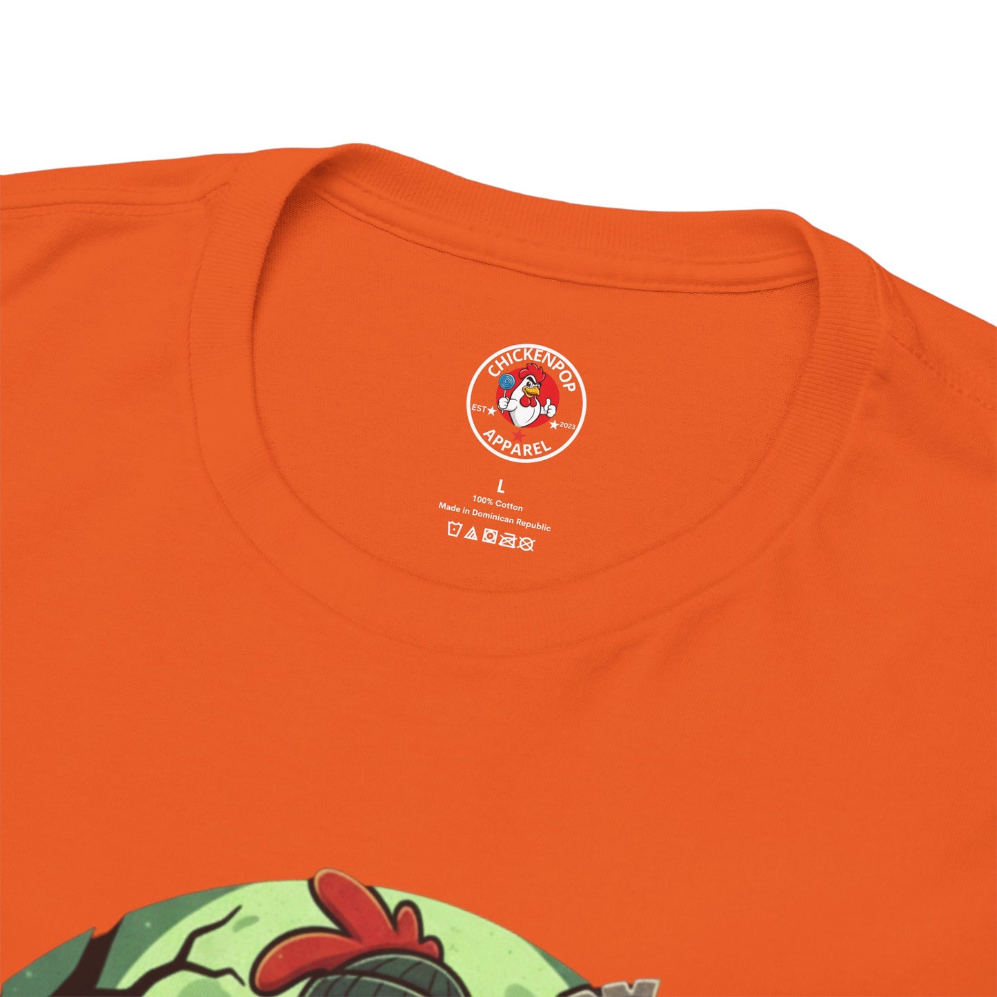 Close-up of orange Zombie Chicken Shirt - King Halloween T-Shirt with spooky chicken graphic and ChickenPro Apparel logo on inner collar